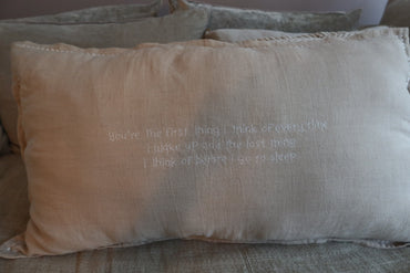 Natural linnen pillow (+ inner) with offwhite embroidered letters 90 x 50 cm no.23